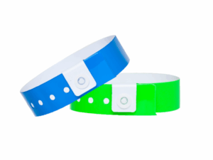 Blue and green vinyl wristbands with a secure white plastic snap. Durable wrist identifiers for events and hotels. Manufacturer AMGS Group.