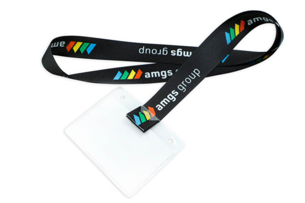 An eco-friendly corporate lanyard made from recycled material, shown with an attached badge holder ready for conference use.
