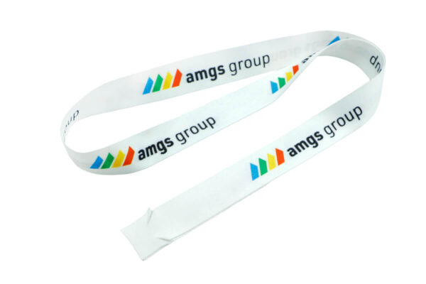 Angled view of a white lanyard with sublimation print, highlighting the texture and quality of the polyester material. AMGS Group.