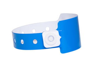 Blue 25mm vinyl wristband with a secure white plastic snap. Side view showing the tamper-proof closure mechanism. Manufacturer AMGS Group.